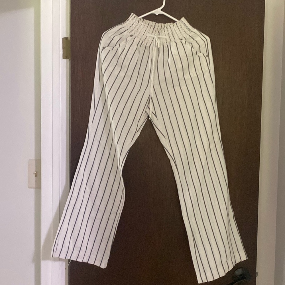 Size small striped pants wide leg flare cut with elastic drawstring waist band.